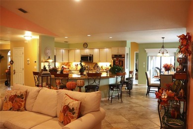 Impressive spacious **FURNISHED* 3 Bedroom, 2 Bathroom home with on Deep Creek Golf Club in Florida - for sale on GolfHomes.com, golf home, golf lot