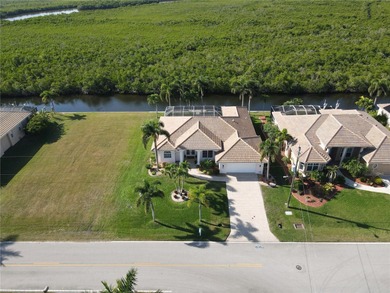 Welcome to Punta Gorda and this beautiful waterfront home in on Twin Isles Country Club in Florida - for sale on GolfHomes.com, golf home, golf lot