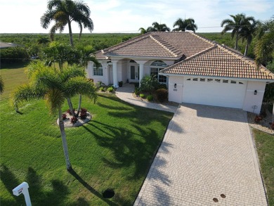Welcome to Punta Gorda and this beautiful waterfront home in on Twin Isles Country Club in Florida - for sale on GolfHomes.com, golf home, golf lot