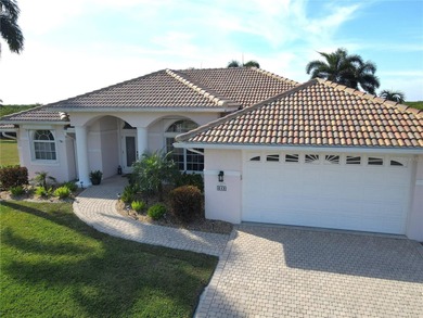 Welcome to Punta Gorda and this beautiful waterfront home in on Twin Isles Country Club in Florida - for sale on GolfHomes.com, golf home, golf lot