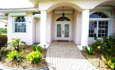 Welcome to Punta Gorda and this beautiful waterfront home in on Twin Isles Country Club in Florida - for sale on GolfHomes.com, golf home, golf lot