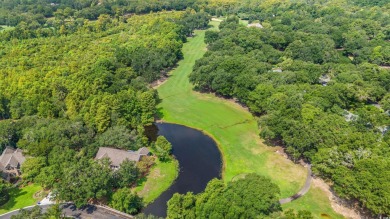 Welcome to this pure gem, tucked away in a secluded corner of on Willbrook Plantation in South Carolina - for sale on GolfHomes.com, golf home, golf lot