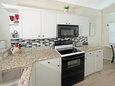 Charming Villa home features 2 bedrooms and 2 bathrooms on The Great Outdoors Golf and Country Club in Florida - for sale on GolfHomes.com, golf home, golf lot