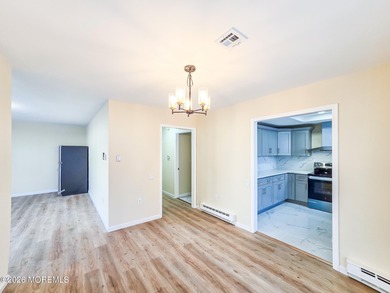 Beautifully renovated 2-bedroom, 1.5-bath ranch with carport on Rossmoor Golf Club in New Jersey - for sale on GolfHomes.com, golf home, golf lot