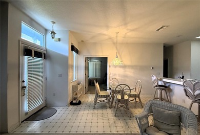 Welcome to 13335 Norman Cir, Hudson, a beautifully maintained on Meadow Oaks Golf and Country Club in Florida - for sale on GolfHomes.com, golf home, golf lot