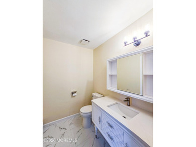 Beautifully renovated 2-bedroom, 1.5-bath ranch with carport on Rossmoor Golf Club in New Jersey - for sale on GolfHomes.com, golf home, golf lot