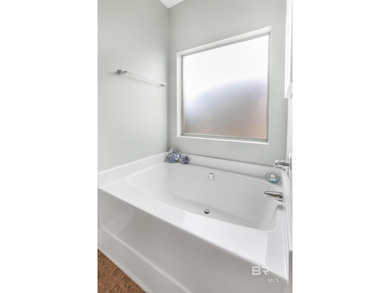 Welcome to this spacious 5 bedroom, 3 bathroom water front home on Craft Farms - Cypress Bend in Alabama - for sale on GolfHomes.com, golf home, golf lot