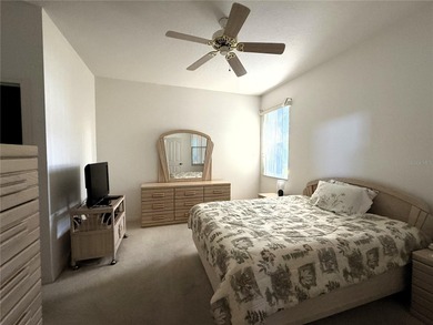 Welcome to 13335 Norman Cir, Hudson, a beautifully maintained on Meadow Oaks Golf and Country Club in Florida - for sale on GolfHomes.com, golf home, golf lot