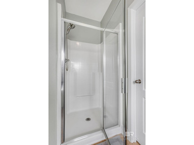 Welcome to this spacious 5 bedroom, 3 bathroom water front home on Craft Farms - Cypress Bend in Alabama - for sale on GolfHomes.com, golf home, golf lot