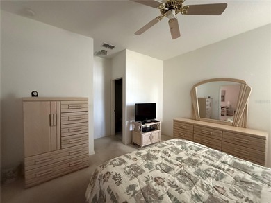 Welcome to 13335 Norman Cir, Hudson, a beautifully maintained on Meadow Oaks Golf and Country Club in Florida - for sale on GolfHomes.com, golf home, golf lot