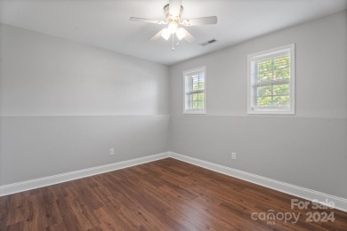 Move in Ready and cute as a button! All new flooring throughout on Lake Louise Golf Club in North Carolina - for sale on GolfHomes.com, golf home, golf lot