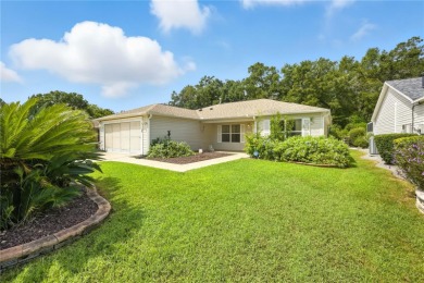 BOND PAID!!! This beautifully maintained 3 bedroom, 3 bathroom on Nancy Lopez Legacy Golf and Country Club in Florida - for sale on GolfHomes.com, golf home, golf lot