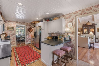 The fabulous outdoor great room defines this charming, classic on Highlands Country Club in North Carolina - for sale on GolfHomes.com, golf home, golf lot
