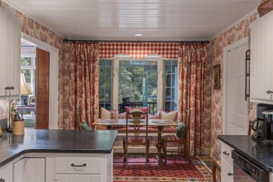 The fabulous outdoor great room defines this charming, classic on Highlands Country Club in North Carolina - for sale on GolfHomes.com, golf home, golf lot