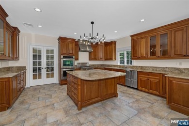 Set on a beautifully landscaped acre with a stunning circular on Old Tappan Golf Course in New Jersey - for sale on GolfHomes.com, golf home, golf lot