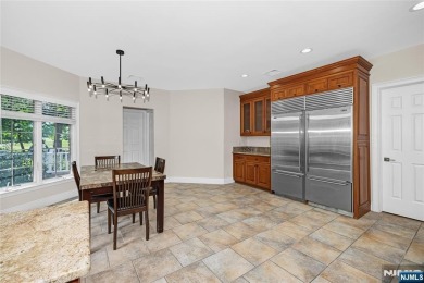 Set on a beautifully landscaped acre with a stunning circular on Old Tappan Golf Course in New Jersey - for sale on GolfHomes.com, golf home, golf lot