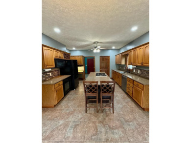 Gorgeous 4 bedroom 2 1/2 bath brick home in Northwestern Schools on Green Acres Golf Club in Indiana - for sale on GolfHomes.com, golf home, golf lot