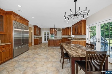 Set on a beautifully landscaped acre with a stunning circular on Old Tappan Golf Course in New Jersey - for sale on GolfHomes.com, golf home, golf lot