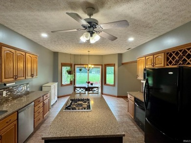Gorgeous 4 bedroom 2 1/2 bath brick home in Northwestern Schools on Green Acres Golf Club in Indiana - for sale on GolfHomes.com, golf home, golf lot