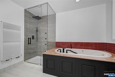 Set on a beautifully landscaped acre with a stunning circular on Old Tappan Golf Course in New Jersey - for sale on GolfHomes.com, golf home, golf lot