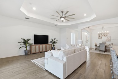 Live the ultimate resort lifestyle in this TURNKEY pool home on Heritage Landing Golf  in Florida - for sale on GolfHomes.com, golf home, golf lot