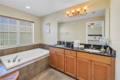 This Beautifully-maintained End-unit townhome in the gated on Feather Sound Country Club in Florida - for sale on GolfHomes.com, golf home, golf lot