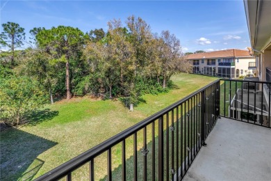 This Beautifully-maintained End-unit townhome in the gated on Feather Sound Country Club in Florida - for sale on GolfHomes.com, golf home, golf lot