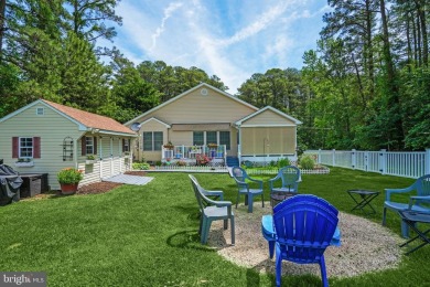 Nestled in the heart of the picturesque Captains Cove community on Captains Cove Golf and Yacht Club in Virginia - for sale on GolfHomes.com, golf home, golf lot
