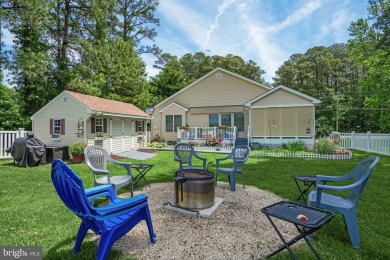 Nestled in the heart of the picturesque Captains Cove community on Captains Cove Golf and Yacht Club in Virginia - for sale on GolfHomes.com, golf home, golf lot