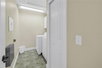 This Beautifully-maintained End-unit townhome in the gated on Feather Sound Country Club in Florida - for sale on GolfHomes.com, golf home, golf lot