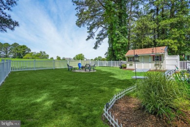 Nestled in the heart of the picturesque Captains Cove community on Captains Cove Golf and Yacht Club in Virginia - for sale on GolfHomes.com, golf home, golf lot