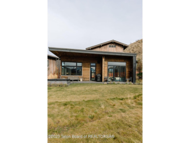 Lodge Cabin 207 at 14175 Drake Drive is one of the last on Snake River Sporting Club in Wyoming - for sale on GolfHomes.com, golf home, golf lot