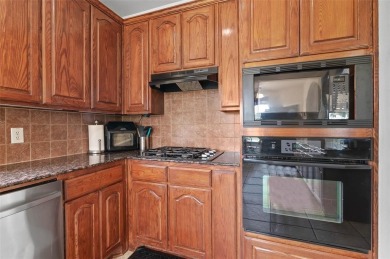 Beautiful 2 story brick home with 3 car garage on the 15th hole on Oakmont Country Club in Texas - for sale on GolfHomes.com, golf home, golf lot