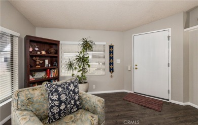 Nestled within the vibrant 55+ active living community of The on Hemet West Mobile Estates in California - for sale on GolfHomes.com, golf home, golf lot