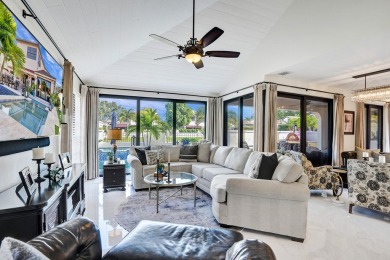 This exceptional waterfront home in Deerfield Beach, FL on Deer Creek Golf Club in Florida - for sale on GolfHomes.com, golf home, golf lot