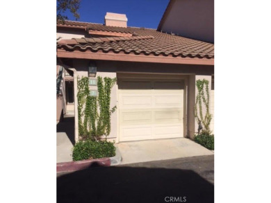 This quiet and serene condominium development is located just on Tijeras Creek Golf Club in California - for sale on GolfHomes.com, golf home, golf lot