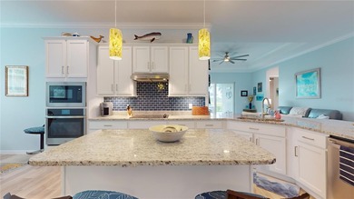 Welcome home to your 4 BEDROOM, 3 BATH, 3 CAR GARAGE STUNNING on Heritage Landing Golf  in Florida - for sale on GolfHomes.com, golf home, golf lot