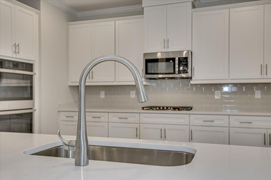 Experience elegant design and everyday functionality in this on Mount Vintage Plantation and Golf Club  in South Carolina - for sale on GolfHomes.com, golf home, golf lot