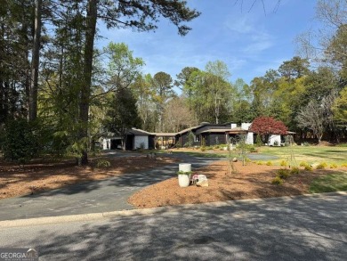 Palatial home with an abundance of unique features and upgrades! on Sunset Hills Country Club in Georgia - for sale on GolfHomes.com, golf home, golf lot