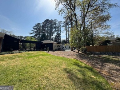 Palatial home with an abundance of unique features and upgrades! on Sunset Hills Country Club in Georgia - for sale on GolfHomes.com, golf home, golf lot