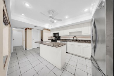 Welcome to this spacious 2-story condo townhouse in the highly on Carrollwood Country Club in Florida - for sale on GolfHomes.com, golf home, golf lot