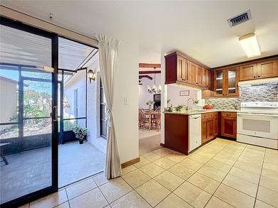 Welcome to your serene waterfront retreat in the highly on Tuscawilla Country Club in Florida - for sale on GolfHomes.com, golf home, golf lot