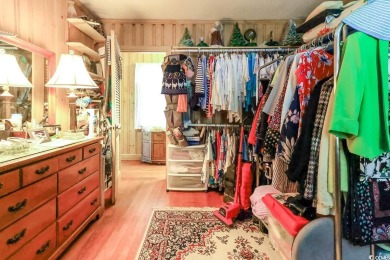 Located just 1,000 feet from the sandy shores of the Atlantic on Whispering Pines in South Carolina - for sale on GolfHomes.com, golf home, golf lot