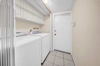 Welcome to this spacious 2-story condo townhouse in the highly on Carrollwood Country Club in Florida - for sale on GolfHomes.com, golf home, golf lot