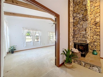 Welcome to your serene waterfront retreat in the highly on Tuscawilla Country Club in Florida - for sale on GolfHomes.com, golf home, golf lot