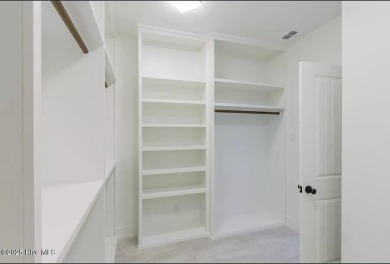 Imagine yourself in this custom built new home with golf course on Sea Trail Golf Resort in North Carolina - for sale on GolfHomes.com, golf home, golf lot