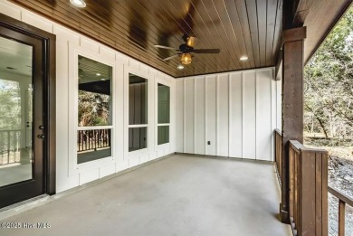 Imagine yourself in this custom built new home with golf course on Sea Trail Golf Resort in North Carolina - for sale on GolfHomes.com, golf home, golf lot