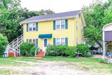 Located just 1,000 feet from the sandy shores of the Atlantic on Whispering Pines in South Carolina - for sale on GolfHomes.com, golf home, golf lot