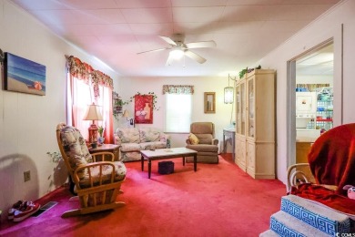 Located just 1,000 feet from the sandy shores of the Atlantic on Whispering Pines in South Carolina - for sale on GolfHomes.com, golf home, golf lot