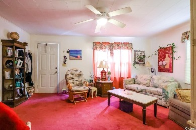 Located just 1,000 feet from the sandy shores of the Atlantic on Whispering Pines in South Carolina - for sale on GolfHomes.com, golf home, golf lot
